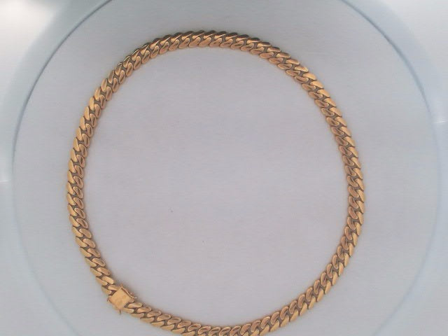 10k Yellow Gold Cadena Cubana Semisolida Combinada 33.4g